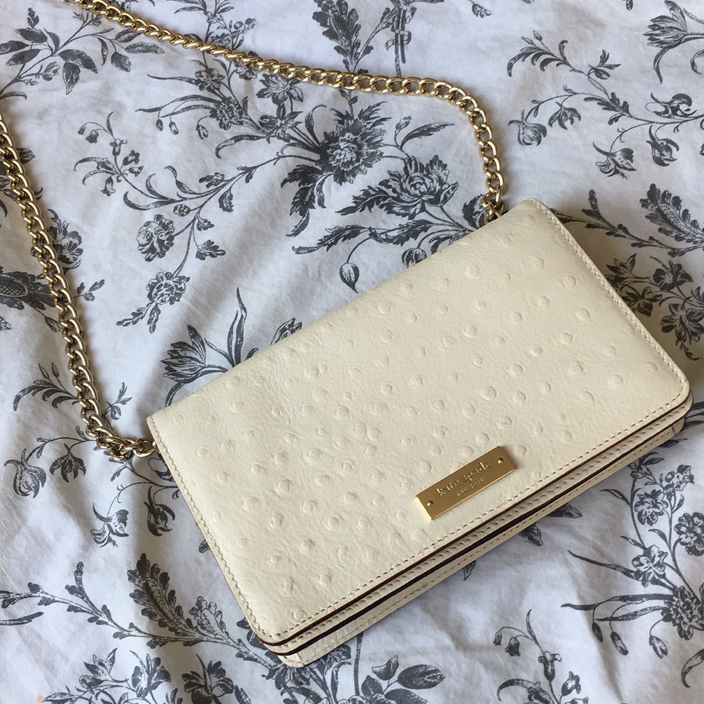 Kate Spade Crossbody Bag. Cream color bag, gold chain